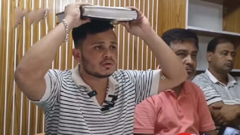 ‘আমি অপহরণ করিনি’ কুরআন মাথায় নিয়ে যুবদল নেতার শপথ